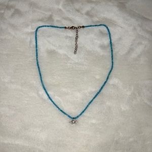 Evil eye seed bead necklace